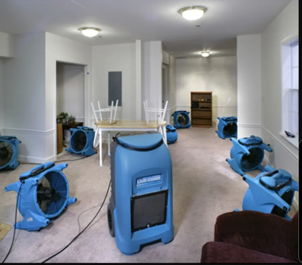 Air movers and dehumidifier setup for Water Damage Restoration in Columbia